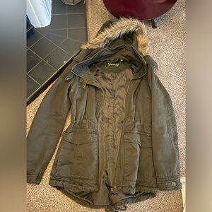 Guess jacket size small with fur - good condition